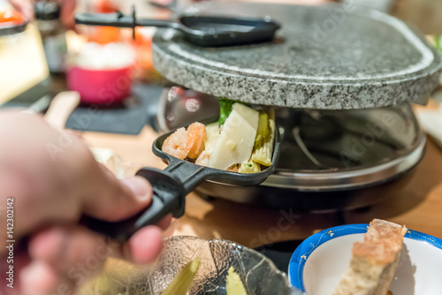 View of Family table for cooking on Raclette photo