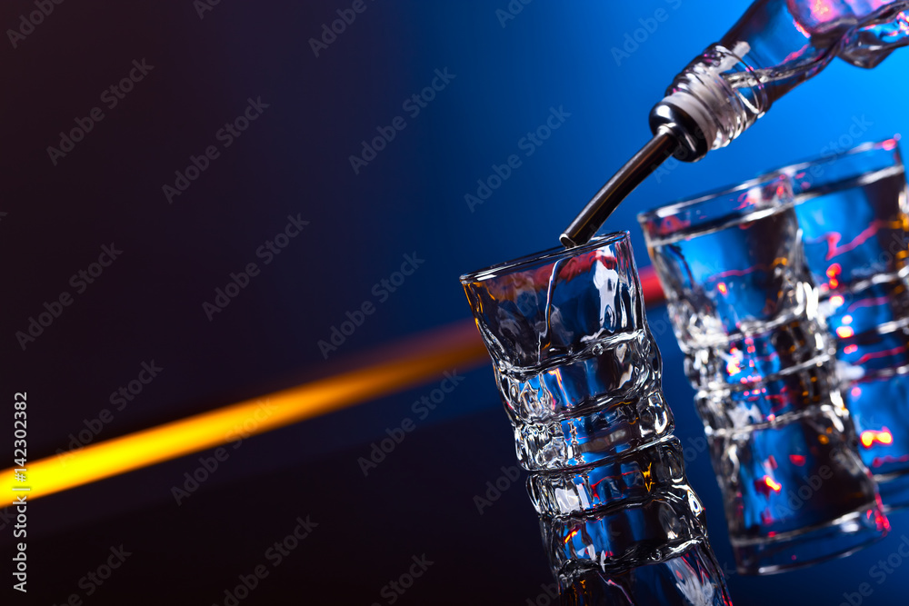vodka in bar on a blue background vodka in bar on a blue background