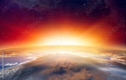 Fototapeta Naklejka Na Ścianę i Meble -  Planet Earth with a spectacular sunset. .