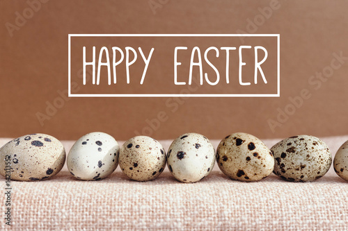 Happy Easter! Festive decoration with quail eggs.