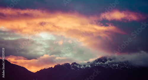Magnificent vivid sunset in mountains of Himalayas, Nepal © Greg Brave