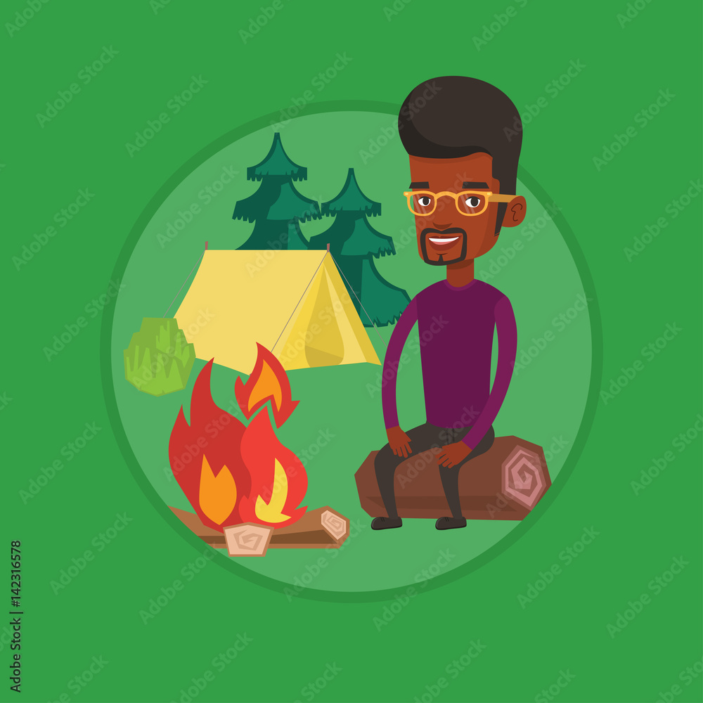 Fototapeta premium Man sitting on log near campfire in the camping.