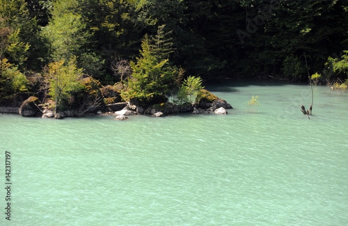 Meltwater Lake in Georgia, Europe: Close-up of aqua hued opaque meltwater lake in Georgia, Europe.  photo