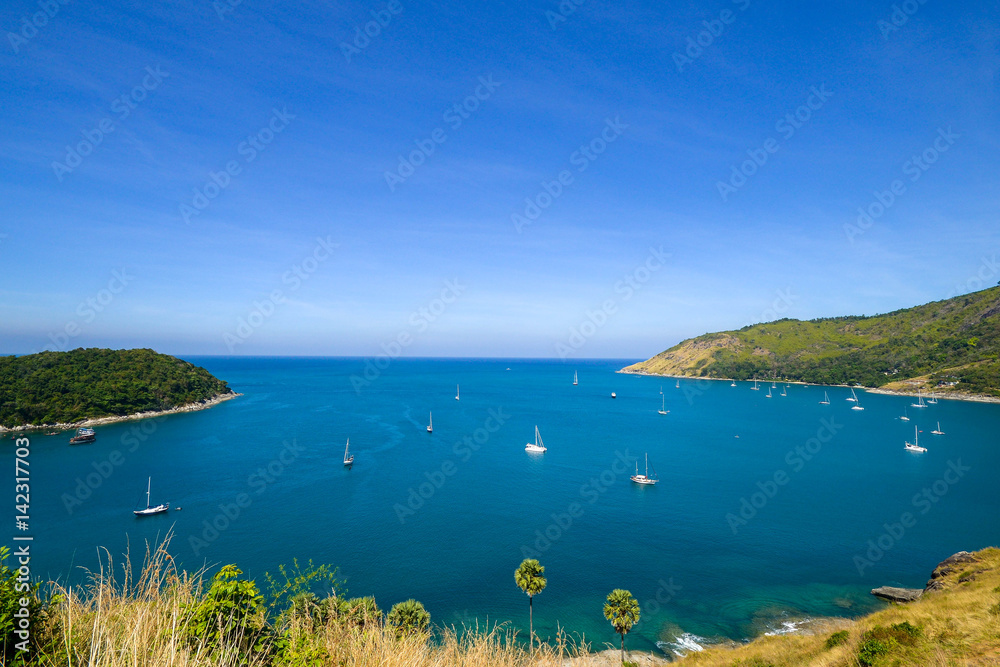 Obraz premium High angle view beautiful landscape of the island and Andaman sea from Windmill viewpoint is a famous attractions of Phuket Province in Thailand