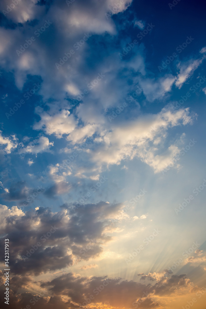 Fototapeta premium Colorful dramatic sky with cloud at sunset.Sky with sun background