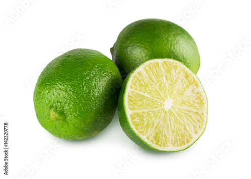 Fresh green limes core closeup isolated on white background