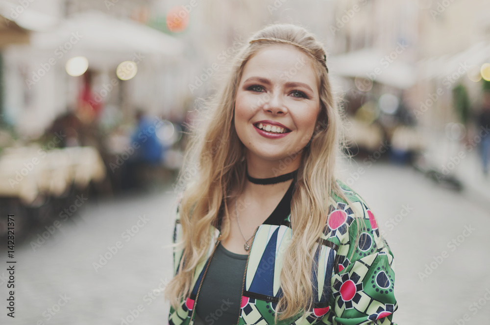 Happy young hipster woman in Rome