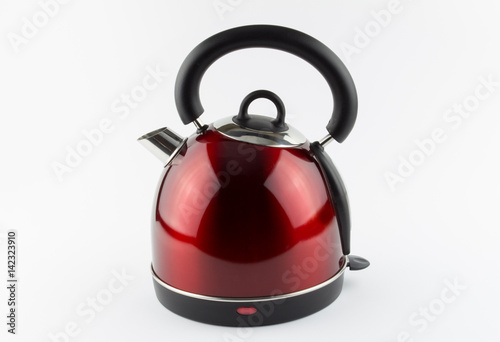 Beautiful design sleek red modern electric water boiler kitchen kettle isolated on white background