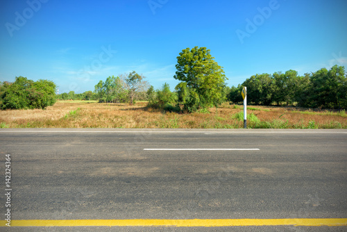 Asphalt road and countryside views