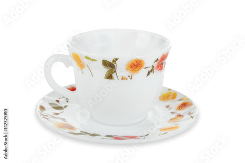 white plate and cup with the image of flowers isolated on a white background