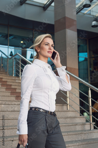 Business woman talking on the phone 