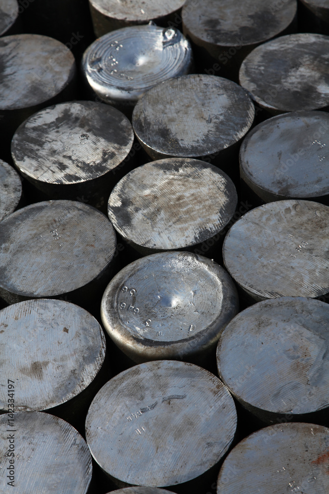 a stack of aluminum casting in stock for background use a stack of aluminum casting in stock for background use