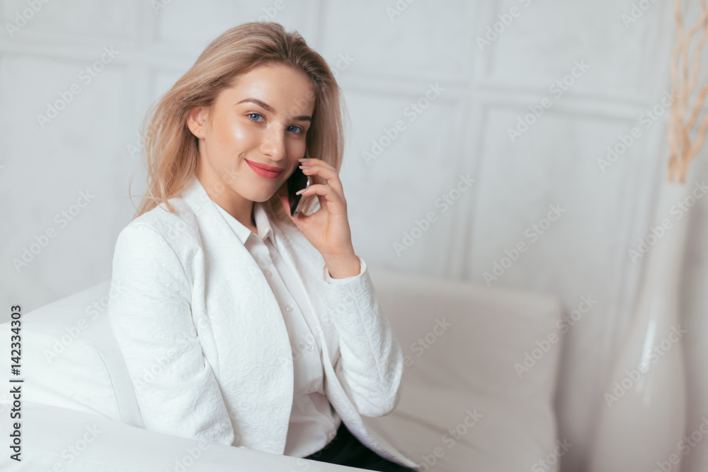 Portrait of beautiful young woman working in the office. Portrait of beautiful young woman working in the office.
