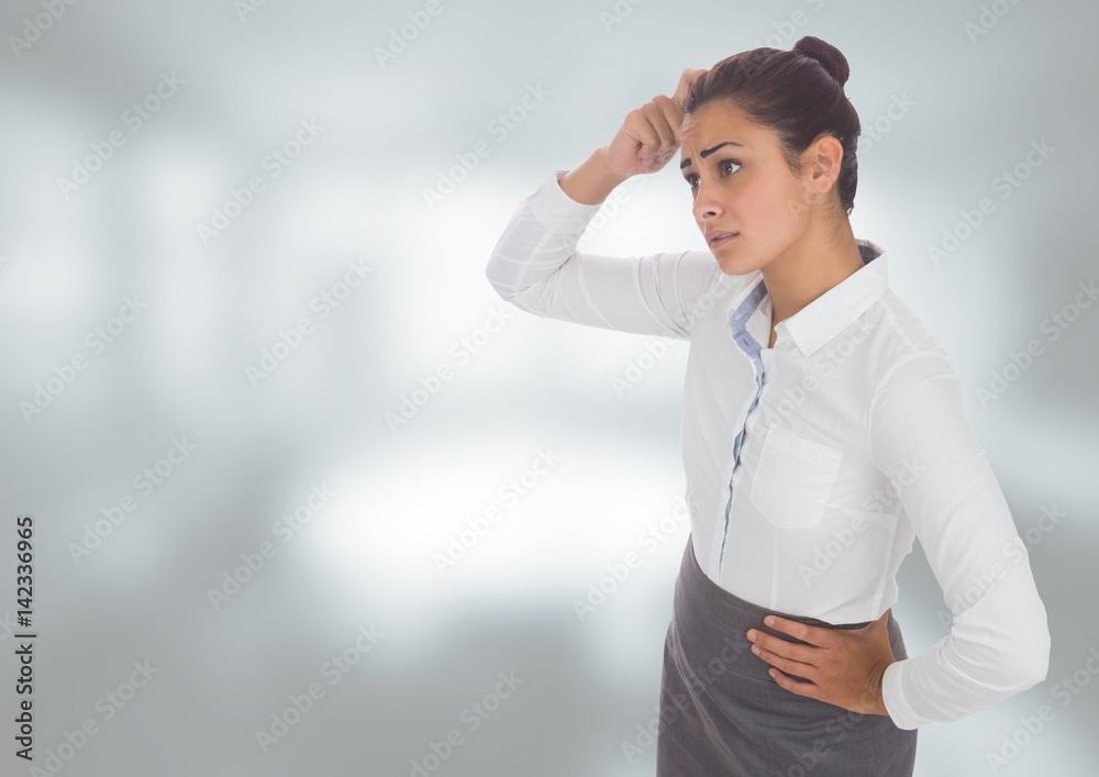 Anxious worried woman against blurred background Anxious worried woman against blurred background