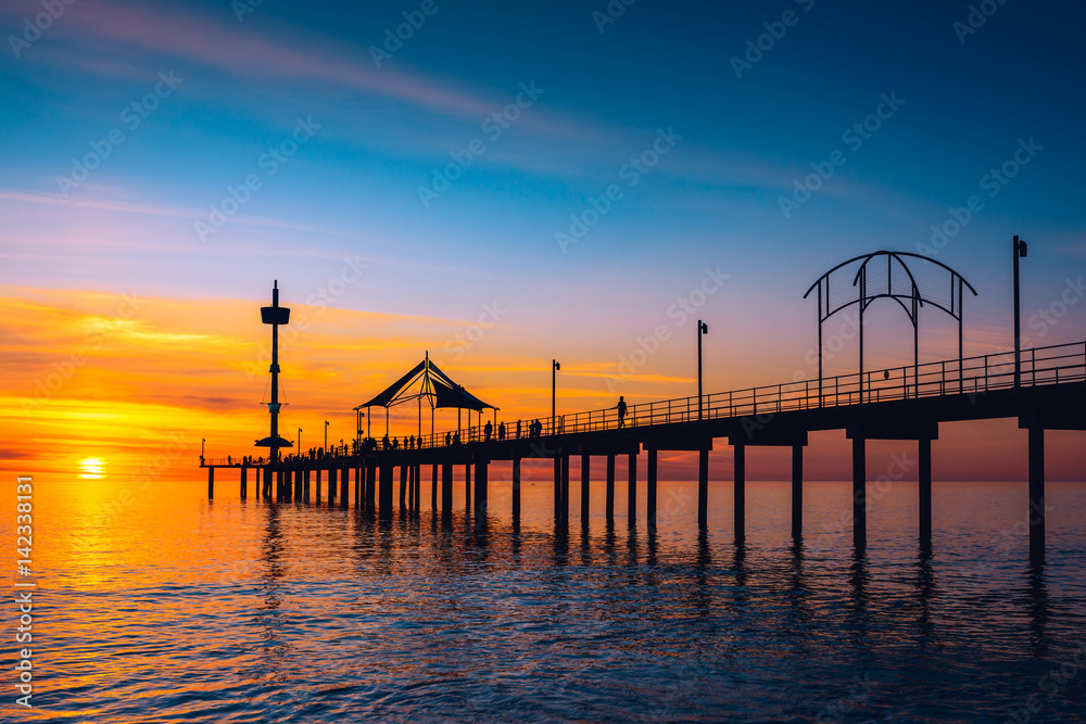 Brighton Jetty with people at sunset