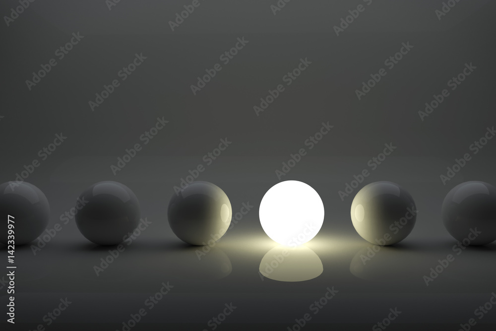 One illuminater ball among grey balls in the row concept. - obrazy, fototapety, plakaty 