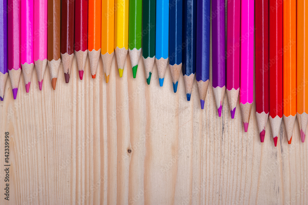 Wooden crayons background with copyspace Stock Photo | Adobe Stock