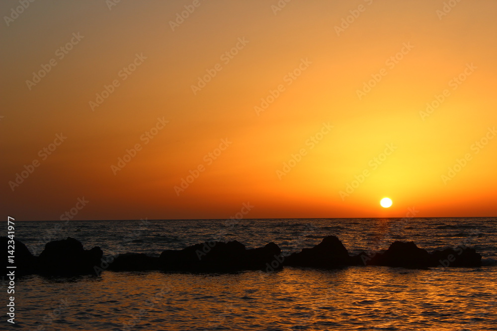 puesta de sol  en la playa 