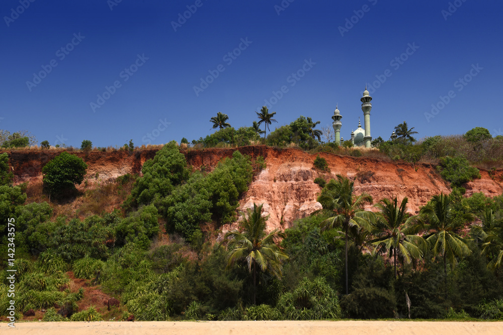 Mosque on top of red colored stones cliff in Varkala, Kerala, India Mosque on top of red colored stones cliff in Varkala, Kerala, India