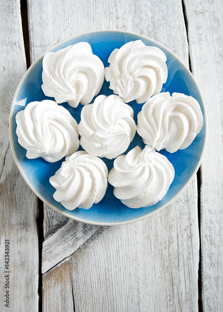 beautiful mirengue on wooden surface beautiful mirengue on wooden surface