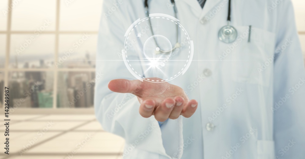 Doctor mid section with white interface and flare on hand against blurry window Doctor mid section with white interface and flare on hand against blurry window