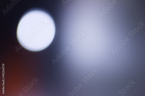 Blurred and defocused abstract background with soft multicolored bokeh, overlay concept.