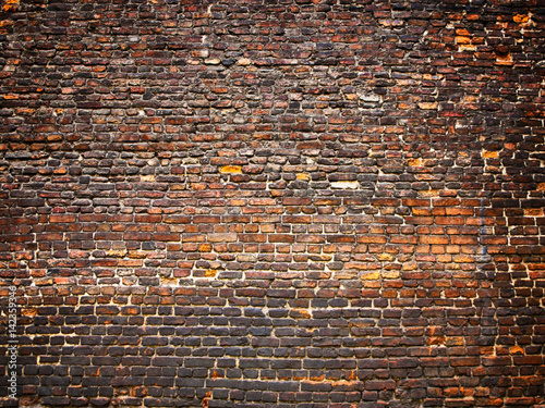 brick wall as background, weathered surface with a vintage effect