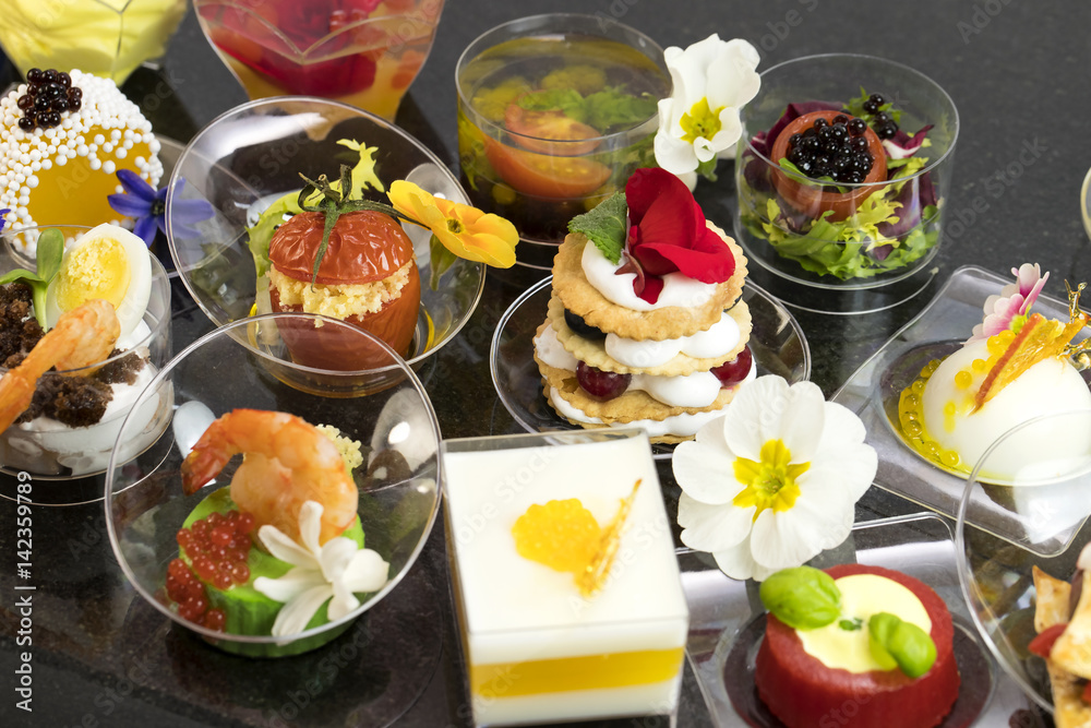 Mini canapes with elements of molecular cuisine on stone Mini canapes with elements of molecular cuisine on stone