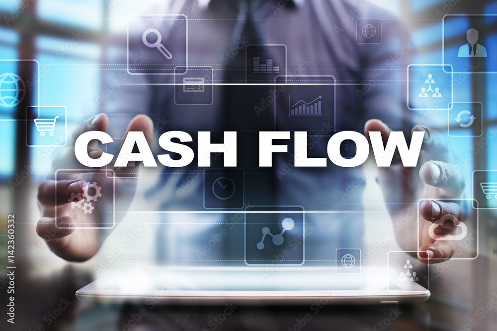 Businessman using tablet pc and selecting cash flow. Businessman using tablet pc and selecting cash flow.