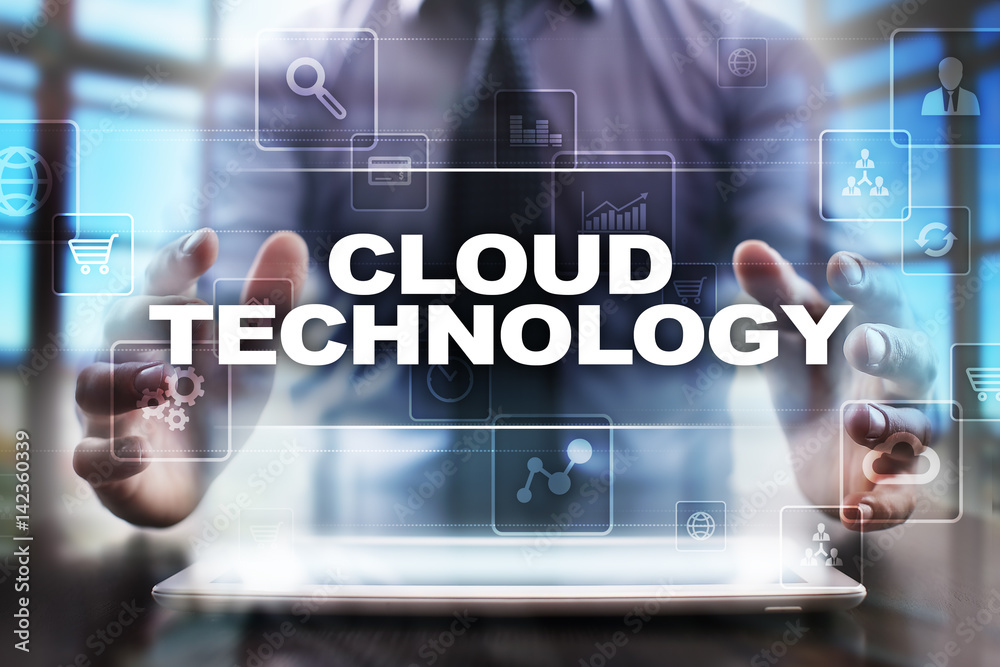 Businessman using tablet pc and selecting cloud technology.