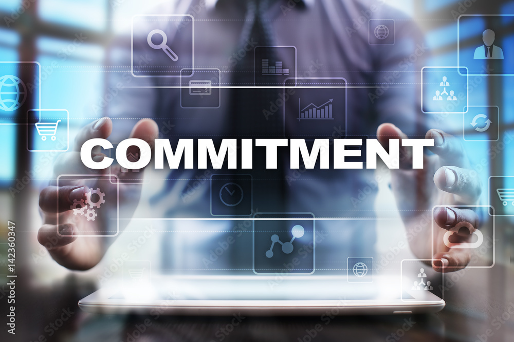 Businessman using tablet pc and selecting commitment. Businessman using tablet pc and selecting commitment.