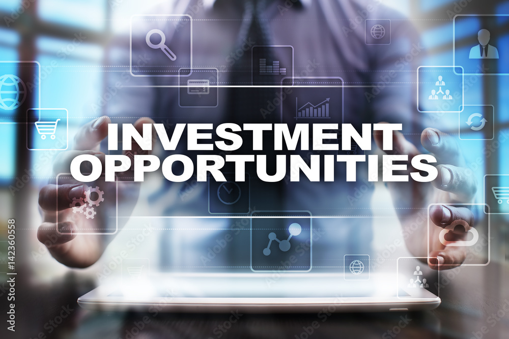 Businessman using tablet pc and selecting investment opportunities. Businessman using tablet pc and selecting investment opportunities.