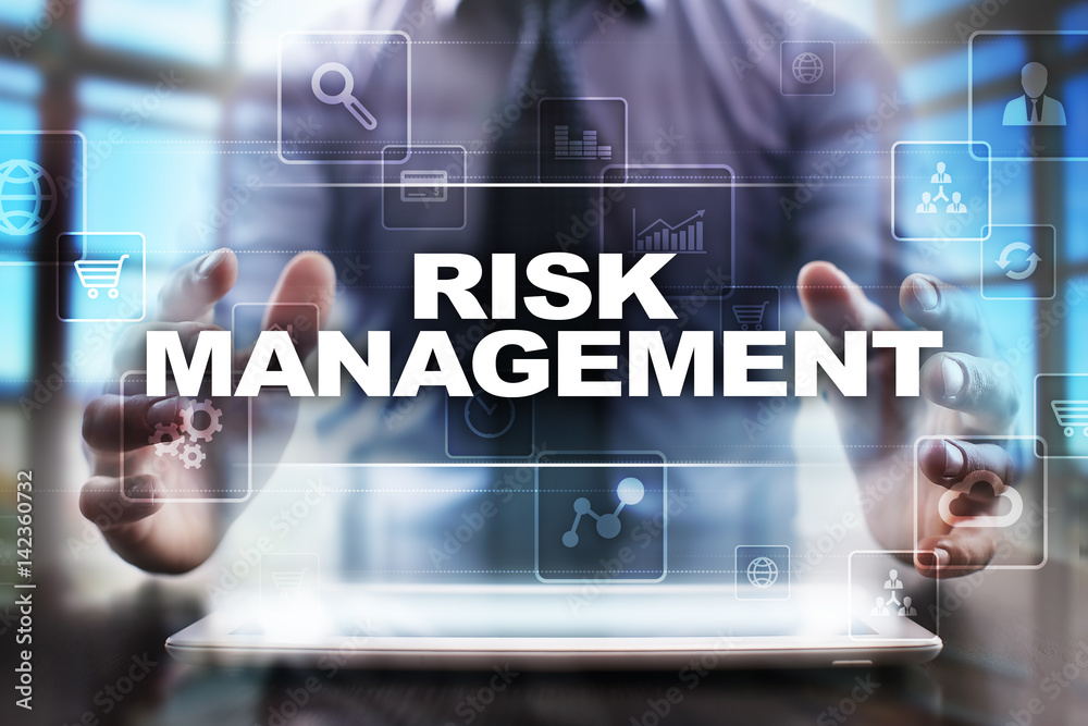 Businessman using tablet pc and selecting risk management. Businessman using tablet pc and selecting risk management.