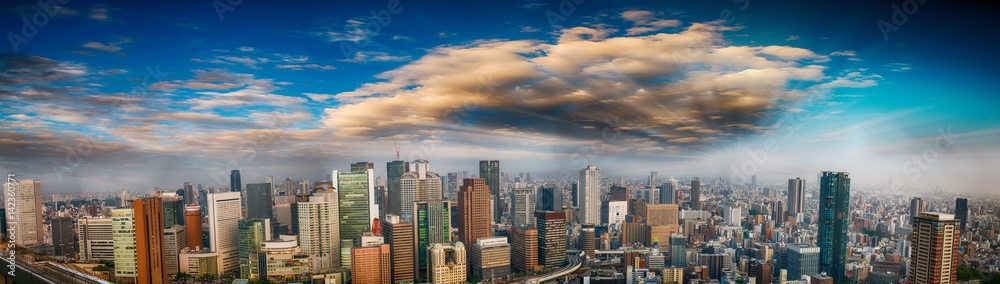 Panoramic aerial view of Osaka skyline at dusk, Japan