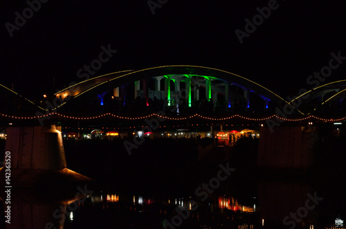 the ratsadapisek bridge of the world war 2 at night in the city of Lampang, Thailand