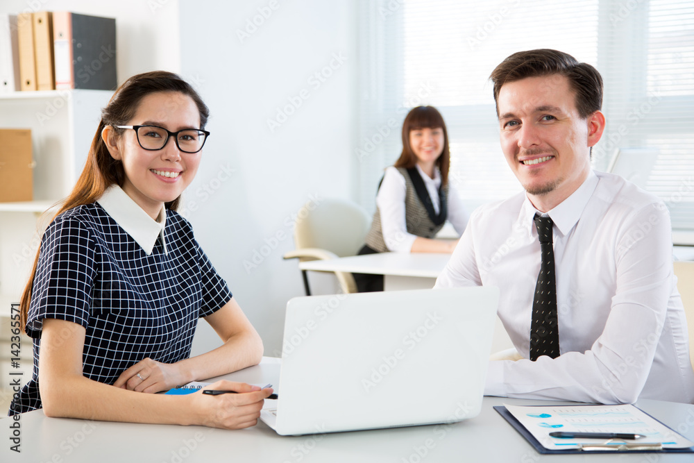 Young businesspeople working with laptop Young businesspeople working with laptop