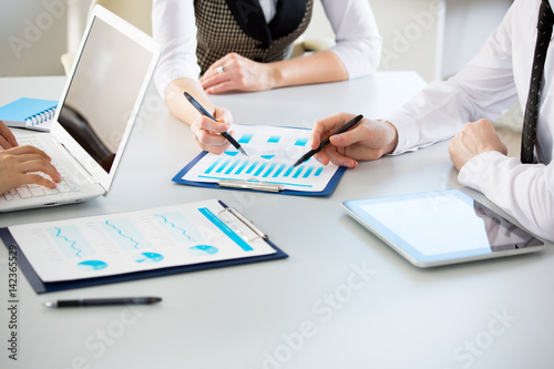 Human hands during paperwork at meeting