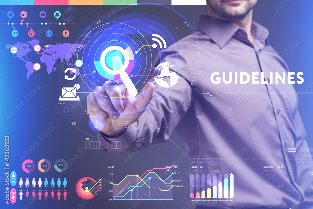 Business, Technology, Internet and network concept. Young businessman working on a virtual screen of the future and sees the inscription: Guidelines Business, Technology, Internet and network concept. Young businessman working on a virtual screen of the future and sees the inscription: Guidelines