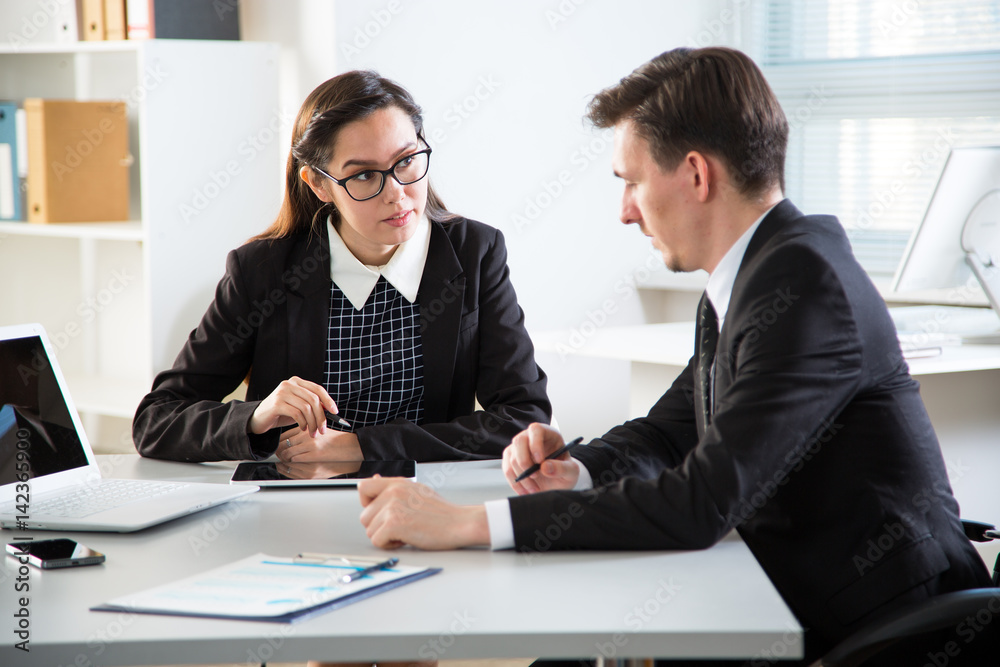 Businesspeople in a meeting at office Businesspeople in a meeting at office