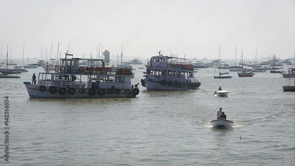 Tourist and fisher boats by the harbour Tourist and fisher boats by the harbour