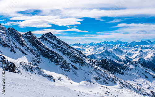 French Alps with sun and clouds