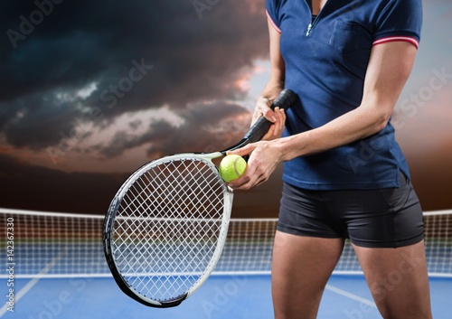 Tennis player on court with evening sky © vectorfusionart