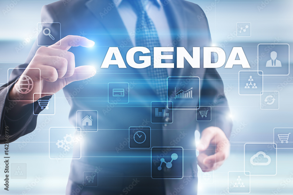 Businessman selecting agenda on virtual screen. Businessman selecting agenda on virtual screen.