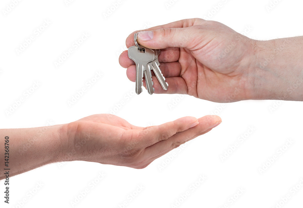 A agent hand give keys to owner isolated on white background
