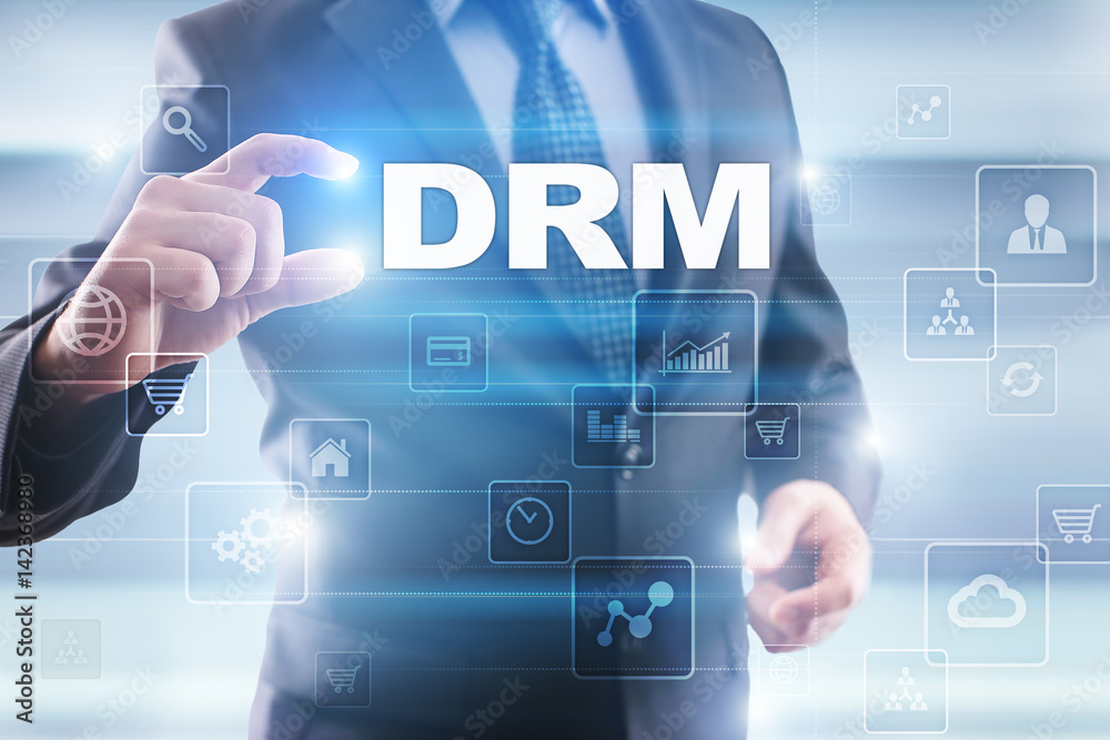 Businessman selecting drm on virtual screen. Businessman selecting drm on virtual screen.
