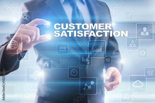 Businessman selecting customer satisfaction on virtual screen.