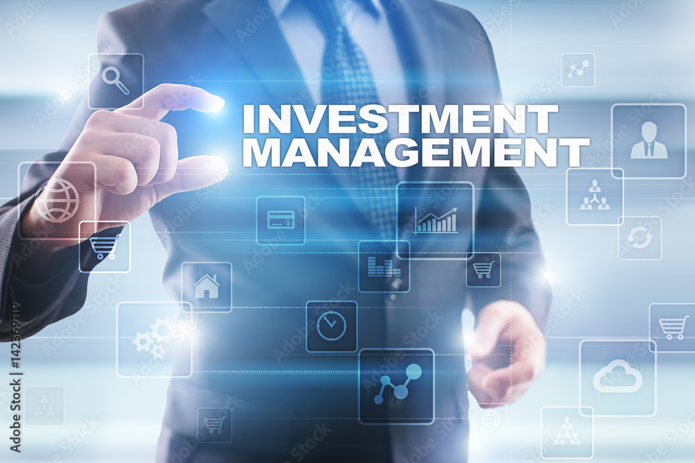 Businessman selecting investment management on virtual screen. Businessman selecting investment management on virtual screen.
