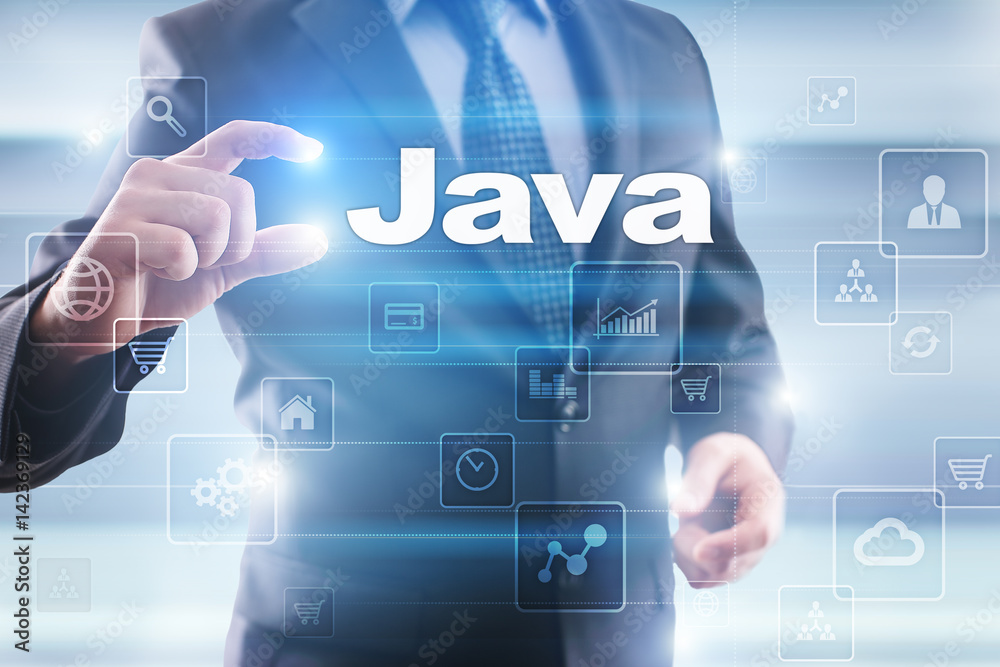 Businessman selecting java on virtual screen. Businessman selecting java on virtual screen.