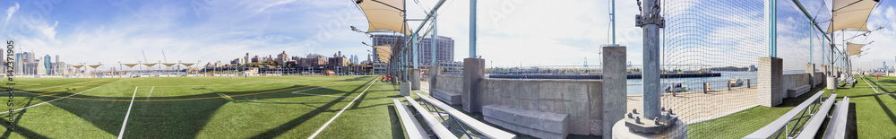 NEW YORK CITY - OCTOBER 2015: Tourists in Brooklyn Bridge Park. New York attracts 50 million tourists annually