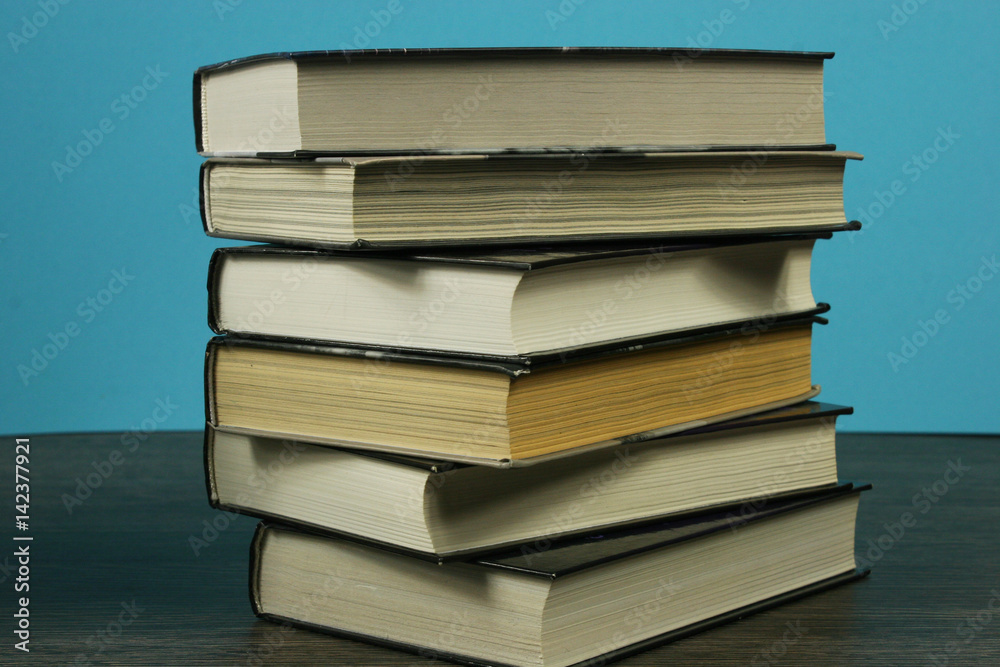 Fototapeta premium A stack of books on the table